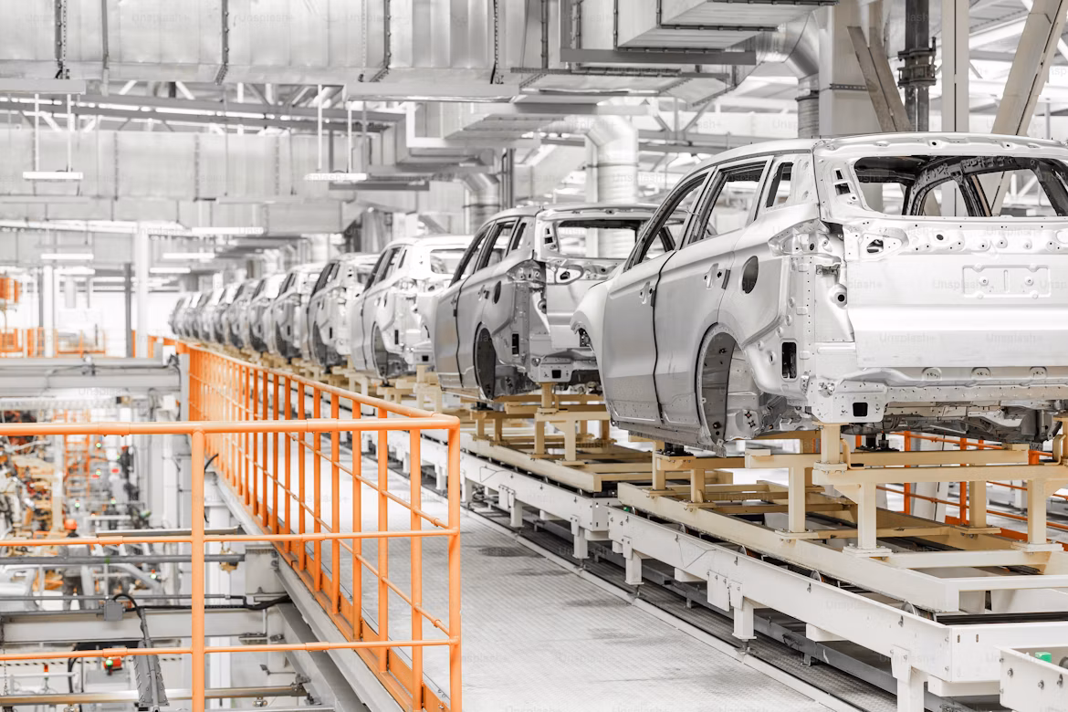 Car bodies moving along an automotive assembly line